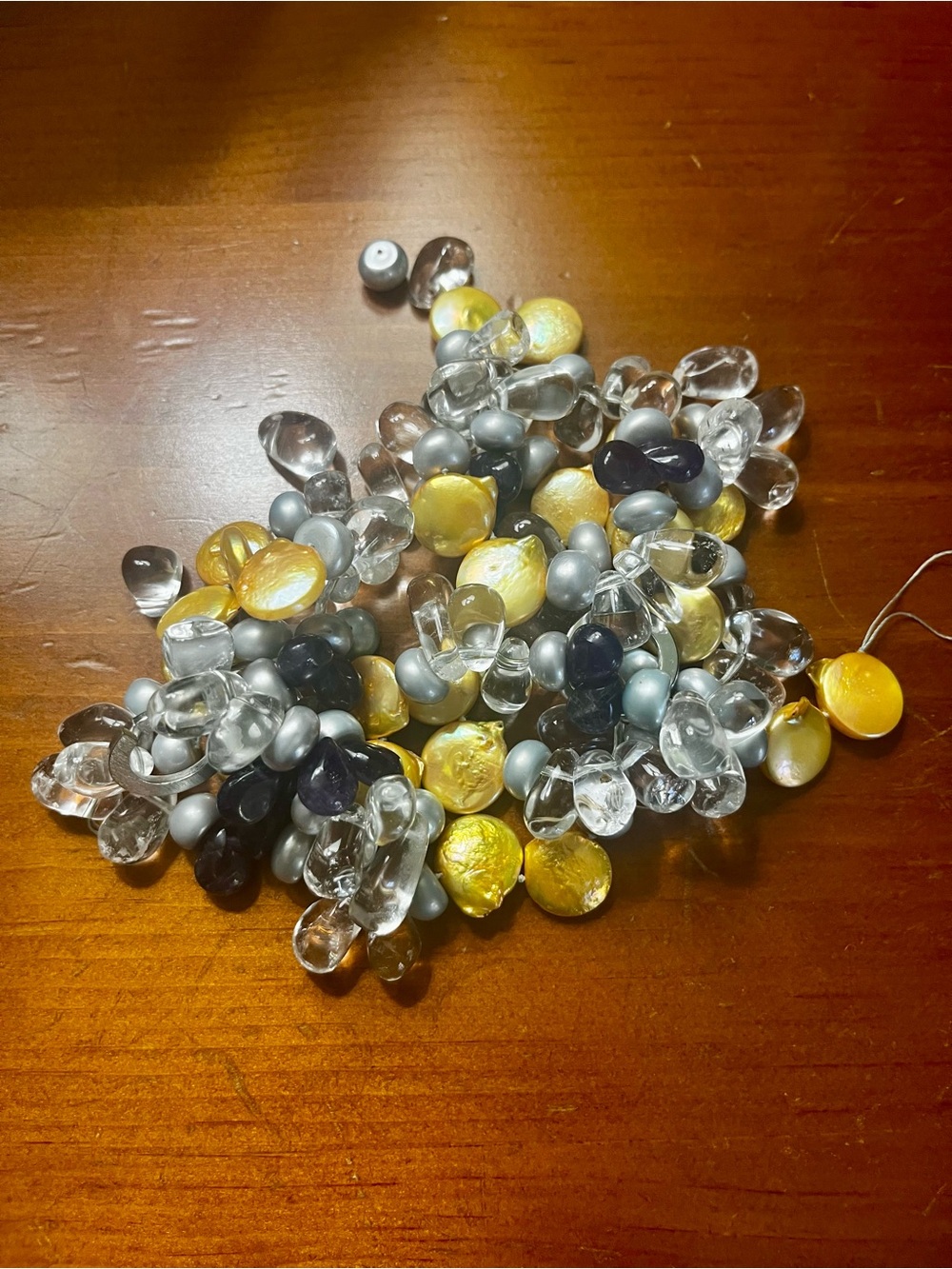 Mixed Glass Beads in Yellow, Clear, Gray and Black.